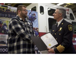 Saskatoon man Evan Pyra was honoured by the Saskatoon Fire Department on Friday, March 29, 2019 for his efforts to notify a woman in the suite above him to the fact the house they were in was on fire. At the Saskatoon Fire Department's Fire Hall No. 1 on Friday, Fire Chief Morgan Hackl awarded Pyra with the Citizen Award of Merit for his efforts, which officials say may have saved a life.