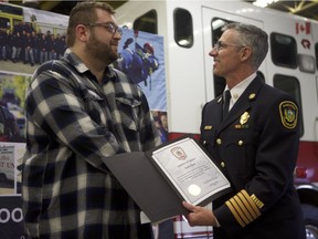 Evan Pyra was honoured by the Saskatoon Fire Department on Friday, March 29, 2019 for his efforts to notify a woman in the suite above him that the house where they live was on fire. At Fire Hall No. 1 on Friday, Fire Chief Morgan Hackl gave Pyra the Citizen Award of Merit for his efforts, which may have saved a life.