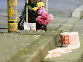 A floral tribute is seen on Linwood Avenue near the Linwood Masjid on March 15, 2019 in Christchurch, New Zealand. 49 people have been confirmed dead and more than 20 are injured following attacks at two mosques in Christchurch.