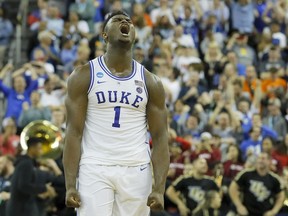 Zion Williamson #1 of the Duke Blue Devils celebrates with his teammates after defeating the UCF Knights in the second round game of the 2019 NCAA Men's Basketball Tournament at Colonial Life Arena on March 24, 2019 in Columbia, South Carolina.
