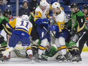 The Saskatoon Blades flood the crease of Prince Albert Raiders goalie Brett Balas in the finals seconds of first period WHL action at SaskTel Centre in Saskatoon on Thursday, December 27, 2018.