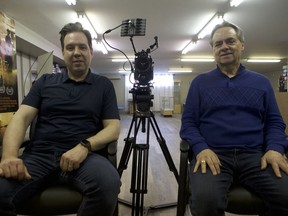 Myron Glova, left, the vice president of Five Stones Films, with Robin Bellamy, of Legacy Pictures, at the Legacy Picture's studio in Saskatoon on March 11, 2019. The aim of Legacy Pictures is to turn your personal history into a feature-length film, all shot in the comfort of your own home.