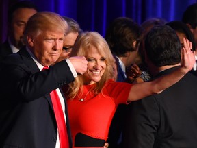 U.S. President Donald Trump flanked by then-campaign manager Kellyanne Conway during election night at the New York Hilton Midtown in New York on November 9, 2016.