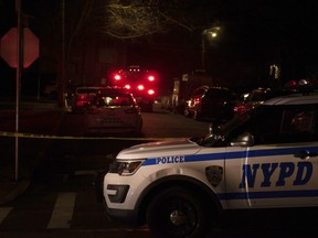 New York Police Department and New York City Fire Department units respond to a report of shots fired Wednesday, March 13, 2019, in the Todt Hill section of the Staten Island borough of New York. A man said by federal prosecutors to have been a top leader of New York's notorious Gambino crime family was shot and killed Wednesday on Staten Island. Francesco "Franky Boy" Cali, 53, was found with multiple gunshot wounds to his body at his home just after 9 p.m.