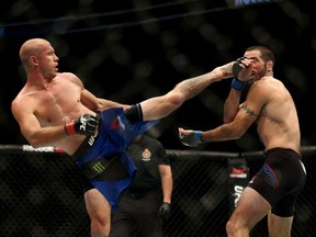 Donald Cerrone, left, lands a kick to the head of Matt Brown during the UFC 206 fight night held at the Air Canada Centre in Toronto, Ont., on Saturday, December 10, 2016. Conor McGregor's apparent retirement has removed a marquee name, and a huge payday, from the ranks of UFC lightweights. But (Raging) Al Iaquinta and Donald (Cowboy) Cerrone soldier on at 155 pounds, looking to move up the rankings topped by hard-nosed Khabib Nurmagomedov. The two face off May 4 in the main event of a televised Ottawa card.