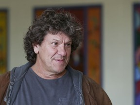 FILE - In this Wednesday, Oct. 14, 2015, file photo, Michael Lang speaks during a tour at the former Zena Elementary School in Woodstock, N.Y. Woodstock co-founder Michael Lang says the wait is almost over regarding performers for Woodstock 50, despite media reports claiming Jay-Z, Black Keys and others will perform at the event in August. The original Woodstock concert took place in 1969. On Thursday, March 7, 2019, Variety reported that Jay-Z, Black Keys, Dead & Company, Chance the Rapper, Imagine Dragons, the Killers, Gary Clark Jr. and others will perform at Woodstock 50.