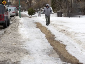 Saskatoon city hall got more than 1,000 complaints about snow and ice on sidewalks in 2018. Here, the sidewalk along McEown Avenue is barely visible in this March 2015 photo.