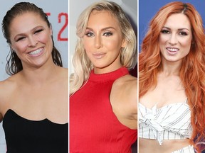 Ronda Rousey, left, Charlotte Flair, centre, and Becky Lynch. (Getty Images)