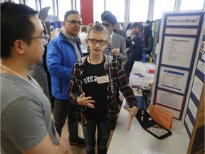 A student at Bishop Filevich School, Taisa Rudy, speaks to judge Luan Chu about her science fair project on allergies at the University of Saskatchewan's College of Education on April 3, 2019. On Wednesday, students from across the city gathered at University of Saskatchewan to participate in the science fair for a chance to win prestige, prizes and an opportunity to participate in the Canada-Wide Science Fair in Fredricton, New Brunswick.