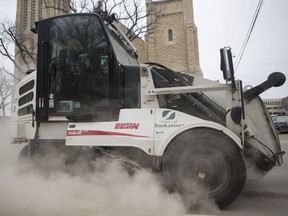 A city of Saskatoon street cleaner gives a demo on street cleaning to the media outside City Hall in Saskatoon, Sask. on Tuesday, April 9, 2019.