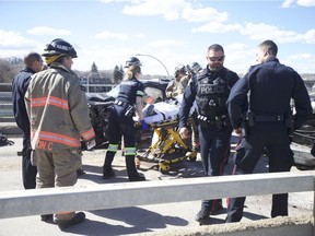 Traffic restrictions were in place on the Traffic Bridge on Monday afternoon following a two-vehicle collision just before 2 p.m. April 8, 2019. Saskatoon police, alongside members of the Saskatoon Fire Department and Medavie Health Services West were also on scene to assist with the response, as two vehicles were badly damaged.