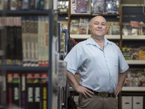 Pat Thompson, owner of 8th Street Books & Comics, stands for a photograph in his store in Saskatoon, SK on Tuesday, April 23, 2019.