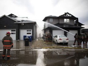 Saskatoon fire rescue battles a blaze at the corner of Salloum Crescent and Salloum Union in Saskatoon, Sk on Saturday, April 27, 2019.