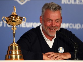 European Ryder Cup captain Darren Clarke smiles during a press conference at Wentworth Golf Club, Virginia Waters, England on Tuesday Aug. 30, 2016. (Andrew Matthews/PA via AP)