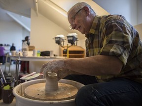 Paul Siwy shows a pottery demonstration during the Saskatoon Potters Guild annual Christmas sale at the Albert Community Centre in Saskatoon, SK on Saturday, November 25, 2017.