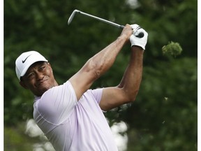 Tiger Woods hits from the fourth tee during the third round for the Masters golf tournament Saturday, April 13, 2019, in Augusta, Ga.