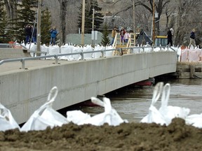 The James Street Bridge in Lumsden was officially closed to traffic as crews sealed the bridge off with sandbags and gravel to help protect the area in case of flooding on April 17, 2011.