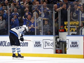 Winnipeg Jets captain Blake Wheeler heads to the penalty box with just over two minutes remaining in the third period Saturday against the St. Louis Blues. Although the Jets scored twice after trailing 3-0, St. Louis won 3-2 to end a best-of-seven first-round series in six games.