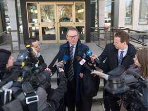 Defence lawyer Aaron Fox speaks with members of the media outside of the Court of Queen's Bench following an appeal hearing for the teen who killed four people in La Loche on Jan. 22, 2016.