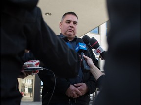 La Loche mayor Robert St. Pierre speaks with members of the media outside of the Court of Queen's Bench following an appeal hearing for the teen who killed four people in La Loche on Jan. 22, 2016. BRANDON HARDER/ Regina Leader-Post