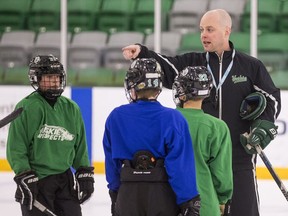 Mark Peterson helps run a hockey practice as part of a new Huskie development sports academy in Saskatoon on Wednesday, May 8 2019.