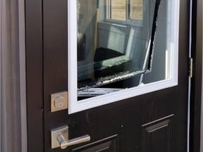 Damage to the door and window of a building on Optimist Hill in Diefenbaker Park in Saskatoon, Sask. Officials who spearheaded the campaign to raise funds for the hill say they're disappointed two buildings on the site were vandalized. Now, they're increasing security in the area.