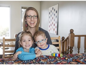 SASKATOON,SK--MAY 3/2019-*0506 news midwifery  - Cynthia Wallace gave birth to her son in her home with the assistance of a midwife. SheÕs now an advocate for access to midwifery care in the province.  Cynthia poses with her daughter Miriam and son Pilgrim in Warman, SK on Friday, May 3 2019.