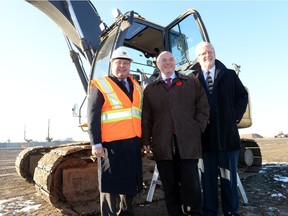 Former Global Transportation Hub CEO Bryan Richards, right, with Bill Boyd and Stephen Taylor at the GTH in 2013.