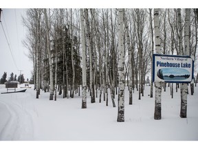 Signs along the road into Pinehouse on Wednesday, January 16, 2019.