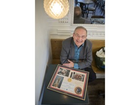 Bill Brooks, who works with people currently in leadership positions, sits for a photograph with objects he collected while working with the the Western Space Education Network, at City Perks coffee shop in Saskatoon, SK on Wednesday, May 15, 2019. Brooks has been a physicist, promoted science, space and innovation to a younger generation and was recognized with the Don Ravis Leadership Saskatoon Community Leadership Award.