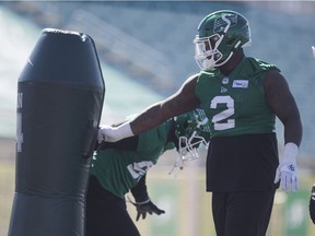 Saskatchewan Roughriders defensive tackle Micah Johnson takes part in a drill during training camp.
