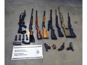 Canadian Border Services Agency members seized 12 undeclared firearms from a Florida man on May 26, 2019. The man now faces three charges under the Customs Act. Canadian Border Services Agency handout