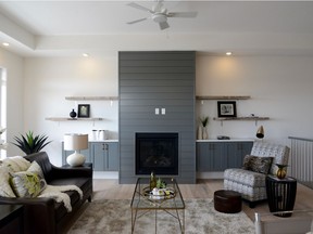 The gas fireplace and surrounding built-in shelving provide an inviting focal point for the main living area. (Jennifer Jacoby-Smith/The StarPhoenix)