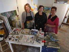 Artists Jane Harington, Bridget Aitken and Miranda Jones stand in one of the studio spaces at The Studio on 20th on April 26, 2019. The three are part of a collective of 11 artists that share the studio space, which is a working studio art patrons can come to meet the artists, commission a work or purchase a unique piece of art.