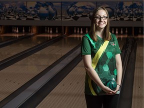 Josie Brooks of Regina, who has been a dominant force in youth bowling, stands in the Glencairn Bolodrome on 9th Avenue in Regina. Brooks is set to compete in her first adult national tournaments this summer. BRANDON HARDER/ Regina Leader-Post