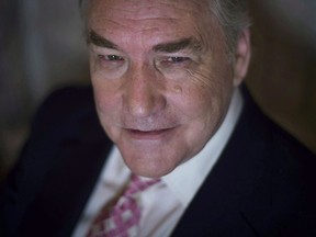 President Donald Trump has granted a full pardon to Conrad Black, a former newspaper publisher who has written a flattering political biography of Trump. Conrad Black poses at the University Club in Toronto on Tuesday, November 11, 2014.