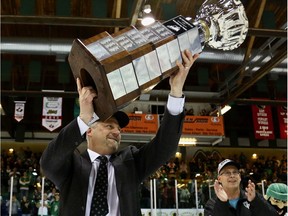Prince Albert Raiders general manager Curtis Hunt holds the Ed Chynoweth Cup, which is awarded to the WHL champion, on Monday.