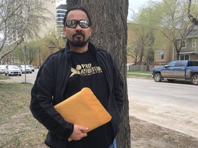 Dion Waniandy, 51, pleaded not guilty on May 14, 2019 to a charge of stunting for giving a Saskatoon police officer the finger while walking in front of a cruiser. (Kathy Fitzpatrick / Saskatoon StarPhoenix)