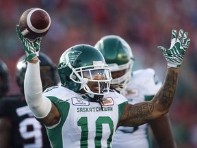 Running back Tre Mason, shown celebrating a touchdown last season, was among three players released by the Saskatchewan Roughriders on Friday.