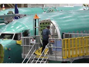 FILE - This March 27, 2019, file photo shows a Boeing 737 MAX 8 airplane on the assembly line during a brief media tour of Boeing's 737 assembly facility in Renton, Wash. Recent crashes have caused an uptick in airline fatalities in 2018 and 2019 after a long trend of safer flying. Boeing 737 Max accidents have raised concern over the ability of all pilots to handle automation. Still, aviation deaths are down sharply from the 1990s, and experts credit advances in aircraft and airport design, better air traffic control, and more pilot training.
