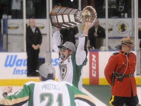 Prince Albert Raiders captain Brayden Pachal lifts the championship after his team won the WHL finals in OT in Game 7 against the Vancouver Giants. Photo by Peter Lozinski, Prince Albert Daily Herald