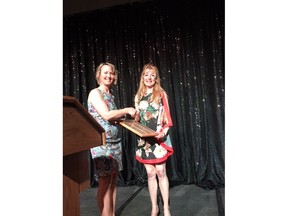 Effie Kutsogiannis, with Your Teeth Saskatoon, was recognized for her work in the community at the Silver Spoon Dinner on May 6, 2019. The award was presented by Karen Toews with CIBC Wood Gundy. Photo taken by Jan Gitlin.