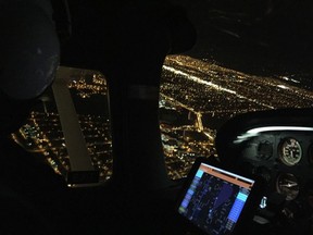 A  view from inside the cockpit of Saskatoon Police Air Support Unit.