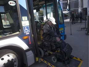 J.D. McNabb tests out a wheel chair accessible bus during an announcement for another accessibility milestone for Saskatoon Transit at TCU Place in Saskatoon, Sk on Thursday, March 28, 2019.
