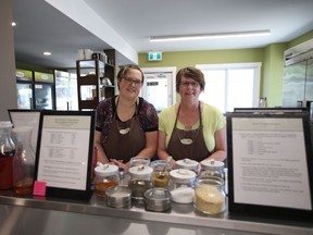 Daphne Stumborg (left) and Diana Schneider (right), co-owners of Dinner Rush in Saskatoon, pose for a photo in their storefront on June 5, 2019.