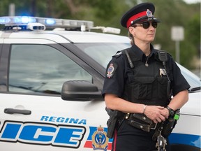 Sgt. Denise Reavley, supervisor of the Regina Police Service's School Resource Officer Unit, stands near her police vehicle at the corner of Elphinstone Street and 10th Avenue. Sgt. Reavley spoke to the Leader-Post regarding how the work of her unit has changed over time.