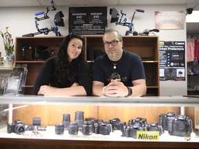 Garrett Fisher (right) and Amanda Dalglish (left) run Paramount Camera Repair in Saskatoon, and receive requests for repairs from photographers across the country. Photo taken June 14, 2019.