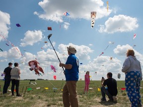 Visitors admire the kite display during the Windscape Kite Festival on the south side of Swift Current on Sunday.