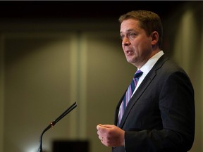(FILES) In this file photo taken on May 07, 2019 Andrew Scheer, leader of the Conservative Party of Canada, speaks at the Montreal Council on Foreign Relations (MCFR), at the Marriott Chateau Champlain in Montreal. - Canada's Conservative Party chief and opposition leader Andrew Scheer said May 28, 2019, he wants to end illegal border crossings from the United States by revisiting the two countries' refugee agreement. "We will work to put an end to the illegal border crossings at unofficial points of entry like Roxham Road by closing the loophole in the Safe Third Country Agreement that allows some people to skip the line and avoid the queue," he said.