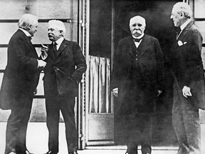 This file photo taken on January 19, 1919 shows British Prime Minister Lloyd George (L), Italian Council President Vittorio Orlando (2nd L), French council President Georges Clemenceau (2nd R) and U.S. President Woodrow Wilson attending the opening day of the Conference for Peace in Paris.